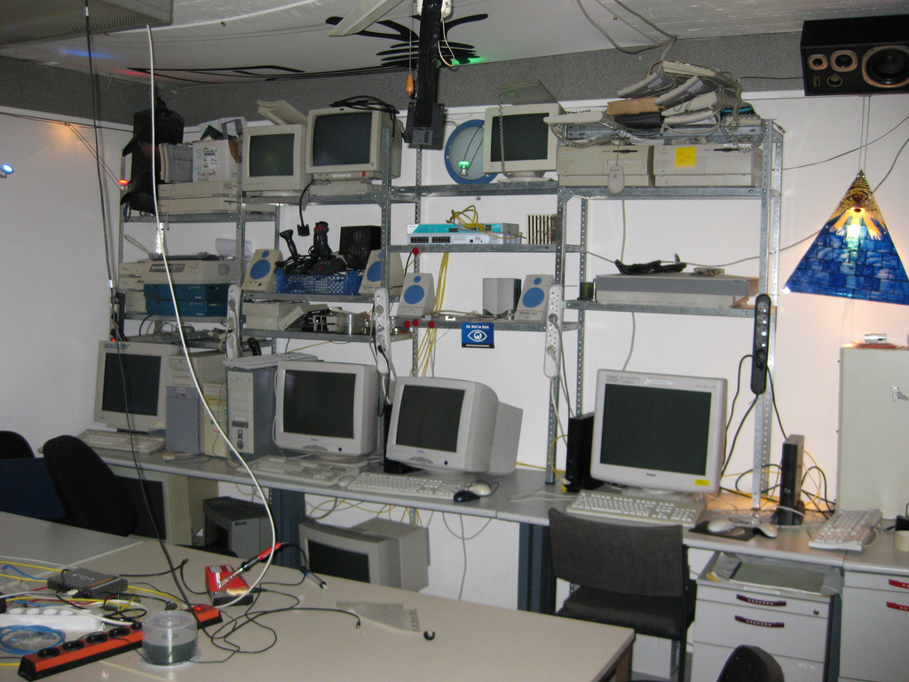 A photo of a very messy, old-school computer lab.